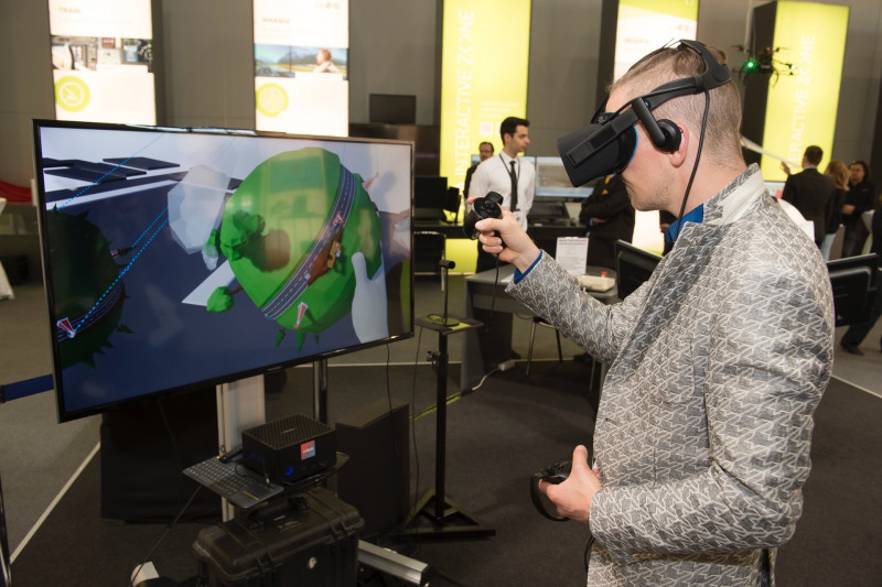 Someone wearing virtual reality-glasses playing a game virtual-reality game